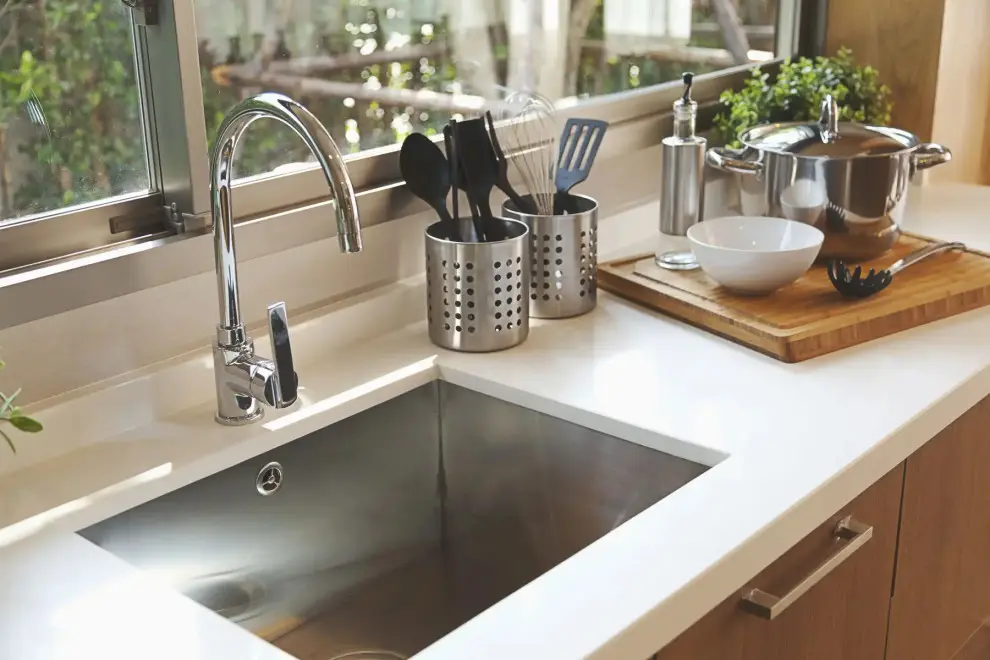 thông tắc chậu rửa bát inox